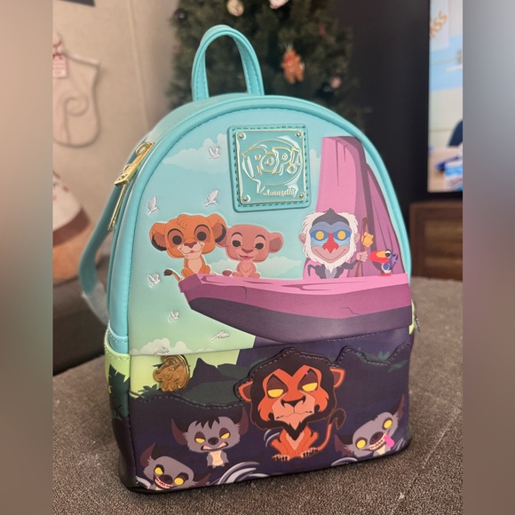 Loungefly Handbags - New Lion King POP! by Loungefly Mini BookBag